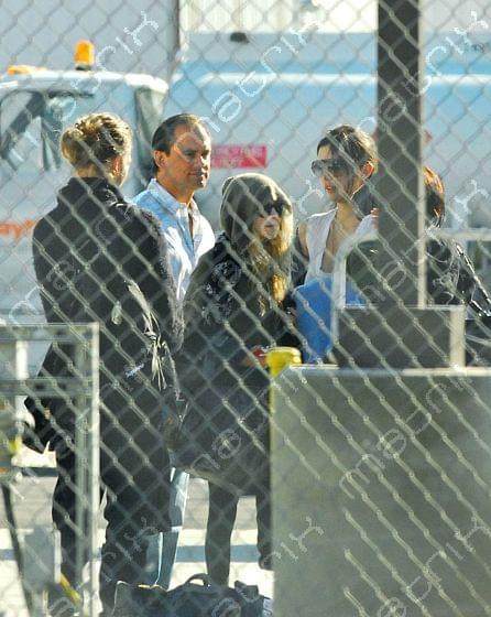 MK, Ashley & Max land at a private airport in L.A